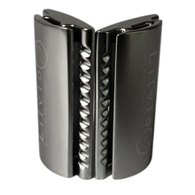 Load image into Gallery viewer, Metallic kitchen tool with textured design on a white background