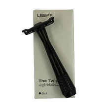 Load image into Gallery viewer, A black safety razor named 'The Twig' by Leaf, displayed on its packaging which is also black with minimalistic design.