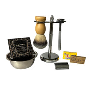 Shaving brush, stand, safety razor, and accessories on a white background