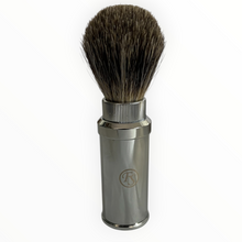 Load image into Gallery viewer, A shaving brush with dark brown and black bristles, a silver ribbed metal neck, and a polished silver metal handle featuring an engraved circular 'RS' monogram logo, set against a plain white background.
