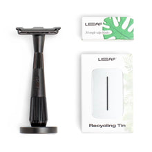 Load image into Gallery viewer, Black safety razor and LEAF branded packaging on a white background
