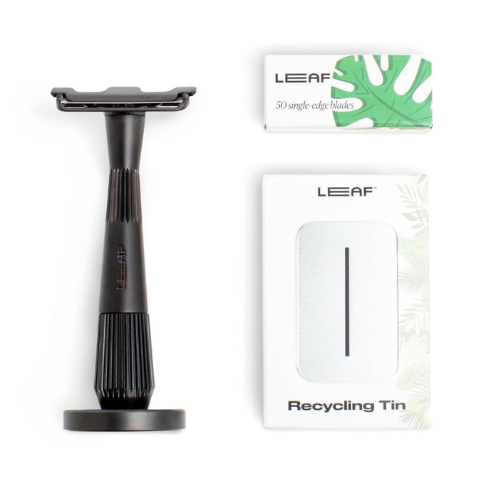 Black safety razor and LEAF branded packaging on a white background